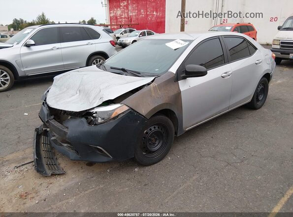 5YFBURHE2GP484691 2016 TOYOTA COROLLA Silver Առջևի ձախ երեք քառորդ տեսարան