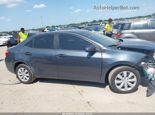 5YFBURHE2HP580337 2017 TOYOTA COROLLA Blue Rear interior view