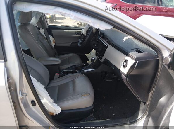 5YFBURHE2HP659815 2017 TOYOTA COROLLA Silver წინა სალონის ხედი
