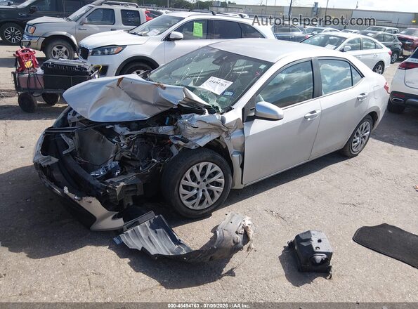 5YFBURHE2HP659815 2017 TOYOTA COROLLA Silver წინა მარცხენა ხედი სამი მეოთხედიდან