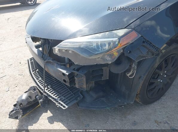 5YFBURHE2KP862968 2019 TOYOTA COROLLA Black Widok z przodu