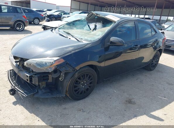 5YFBURHE2KP862968 2019 TOYOTA COROLLA Black Przód lewy