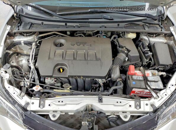 5YFBURHE3JP844185 2018 TOYOTA COROLLA Silver Vista interior trasera