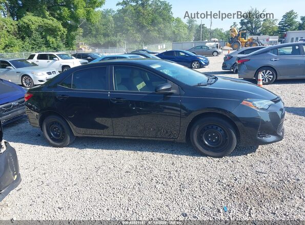 5YFBURHE3KP862686 2019 TOYOTA COROLLA Black Widok wnętrza z tyłu