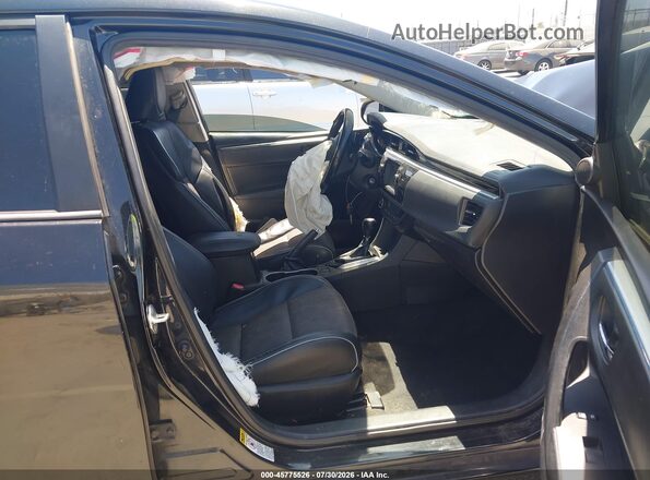 5YFBURHE4GP437369 2016 TOYOTA COROLLA Черный Вид салона спереди