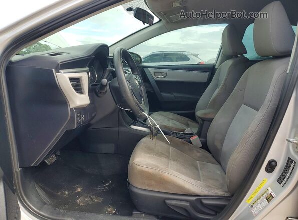 5YFBURHE4GP501863 2016 TOYOTA COROLLA Silver Vista interior delantera