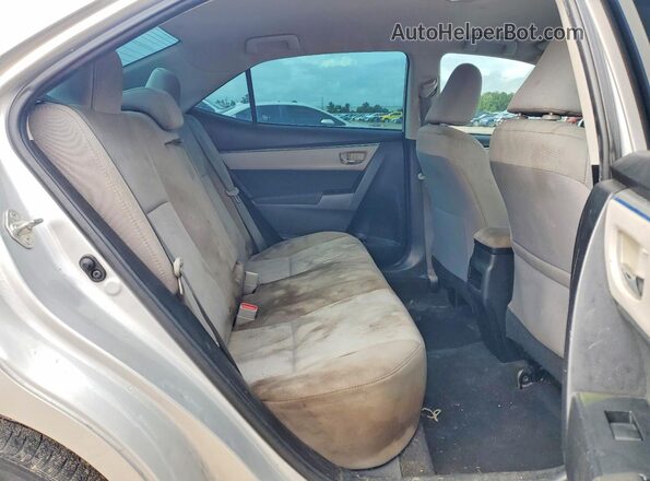 5YFBURHE4GP501863 2016 TOYOTA COROLLA Silver Vista interior trasera