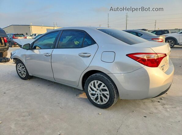 5YFBURHE4HP569176 2017 TOYOTA COROLLA Silver Tył lewy