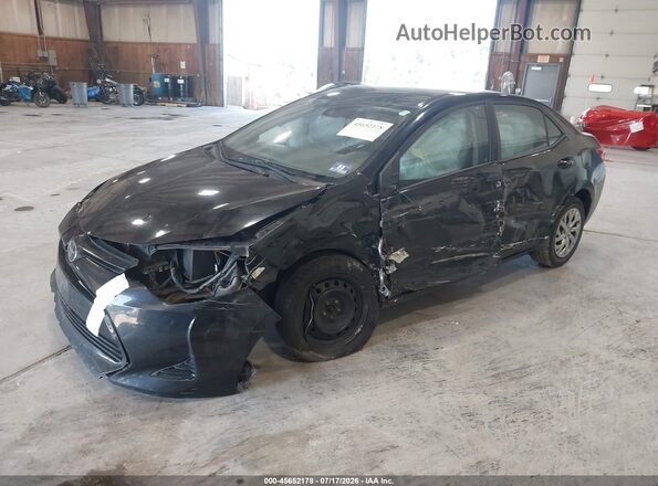 5YFBURHE4HP641008 2017 TOYOTA COROLLA Черный Передняя левая четверть