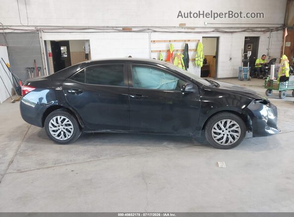 5YFBURHE4HP641008 2017 TOYOTA COROLLA Черный Вид задней части салона