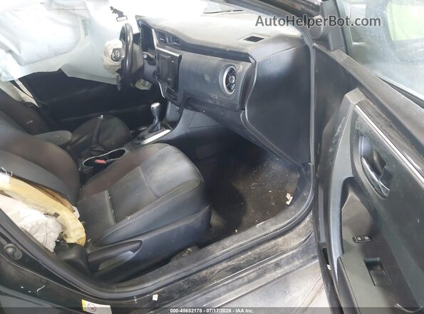 5YFBURHE4HP641008 2017 TOYOTA COROLLA Черный Вид салона спереди