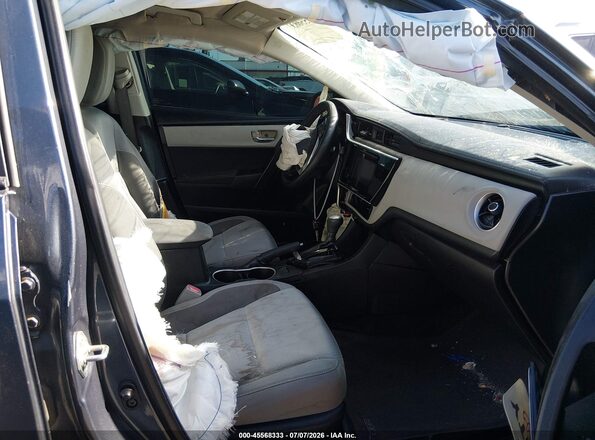 5YFBURHE4HP644734 2017 TOYOTA COROLLA Gray Widok wnętrza z przodu