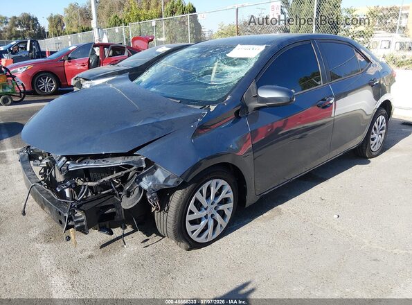5YFBURHE4HP644734 2017 TOYOTA COROLLA Gray Przód lewy
