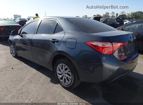 5YFBURHE4HP644734 2017 TOYOTA COROLLA Gray Tył lewy