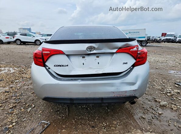 5YFBURHE4HP656639 2017 TOYOTA COROLLA Серебряный Вид сзади