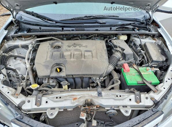 5YFBURHE4HP656639 2017 TOYOTA COROLLA Серебряный Вид задней части салона