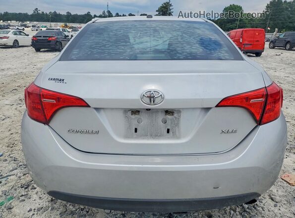 5YFBURHE4HP659640 2017 TOYOTA COROLLA Silver Vista trasera
