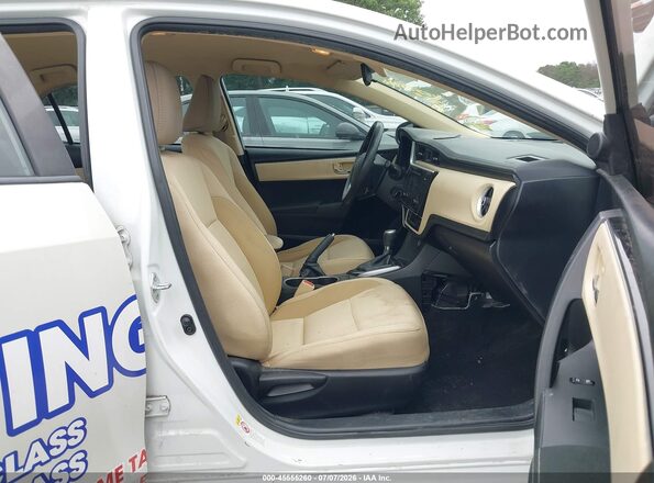 5YFBURHE4HP660562 2017 TOYOTA COROLLA White Front interior view