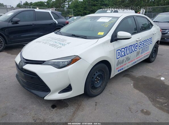 5YFBURHE4HP660562 2017 TOYOTA COROLLA White Front left