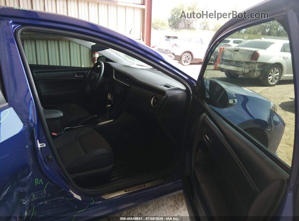 5YFBURHE4HP680486 2017 TOYOTA COROLLA Blue Widok wnętrza z przodu