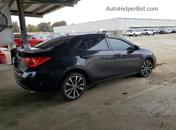 5YFBURHE4HP680956 2017 TOYOTA COROLLA Black Tył prawy