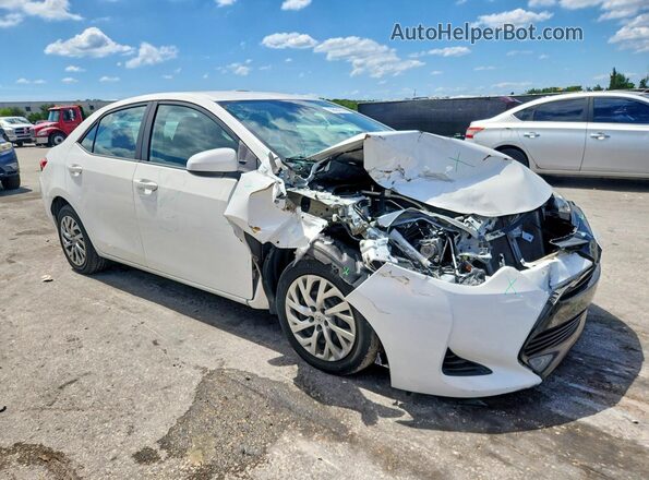 5YFBURHE4HP733851 2017 TOYOTA COROLLA White Front right