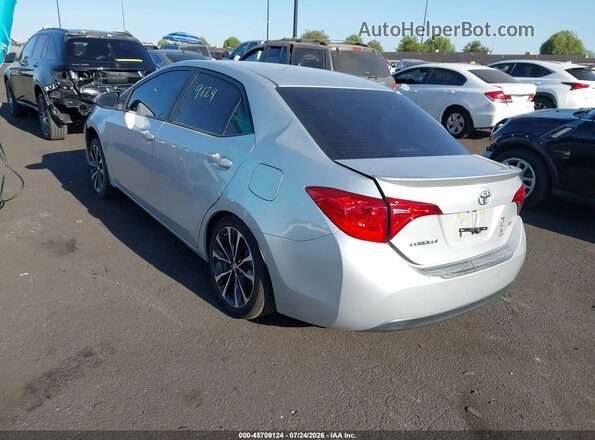 5YFBURHE4JP748310 2018 TOYOTA COROLLA White Trasero izquierdo