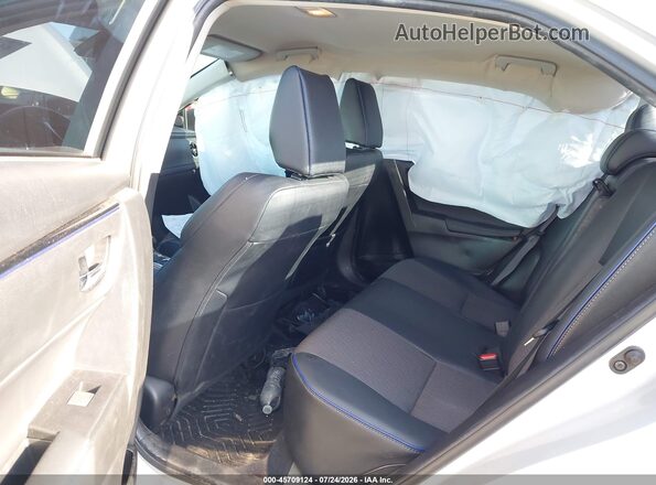 5YFBURHE4JP748310 2018 TOYOTA COROLLA White Vista de la etiqueta del VIN