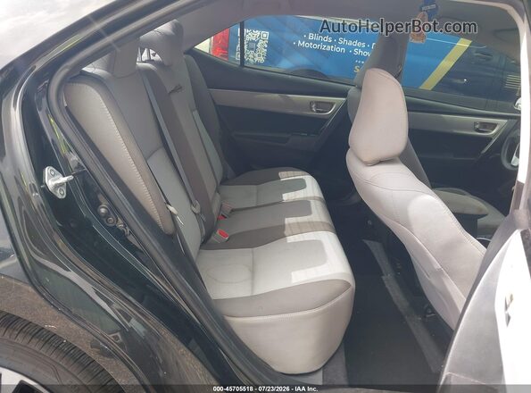 5YFBURHE4JP767133 2018 TOYOTA COROLLA Black Widok naklejki z numerem VIN