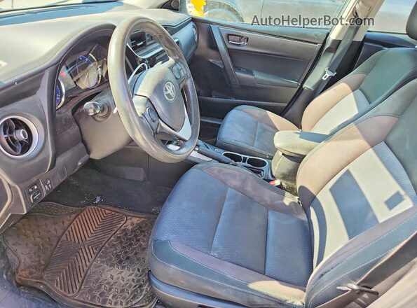 5YFBURHE4JP831655 2018 TOYOTA COROLLA Black Front interior view