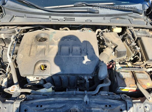 5YFBURHE4JP831655 2018 TOYOTA COROLLA Black Rear interior view