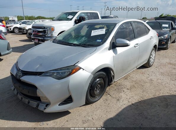 5YFBURHE4KP856508 2019 TOYOTA COROLLA Silver Przód lewy