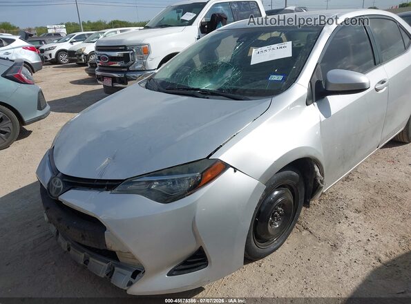 5YFBURHE4KP856508 2019 TOYOTA COROLLA Silver Widok z przodu