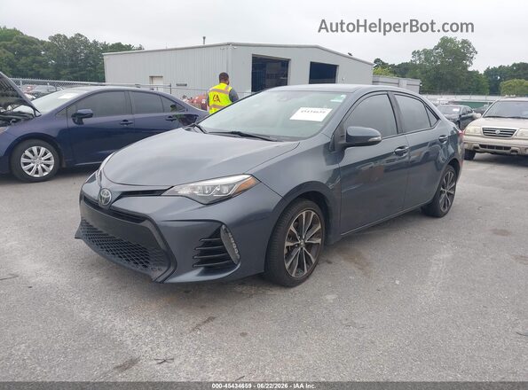 5YFBURHE4KP870943 2019 TOYOTA COROLLA Gray Front left