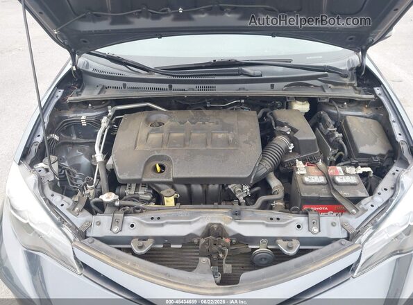 5YFBURHE4KP870943 2019 TOYOTA COROLLA Gray Rear view