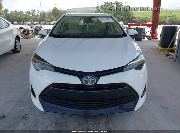 5YFBURHE4KP871638 2019 TOYOTA COROLLA White ხელსაწყოთა პანელის ხედი