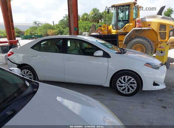 5YFBURHE4KP871638 2019 TOYOTA COROLLA White უკანა სალონის ხედი