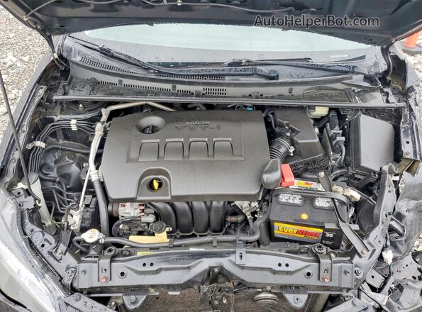 5YFBURHE4KP881182 2019 TOYOTA COROLLA Black Widok wnętrza z tyłu