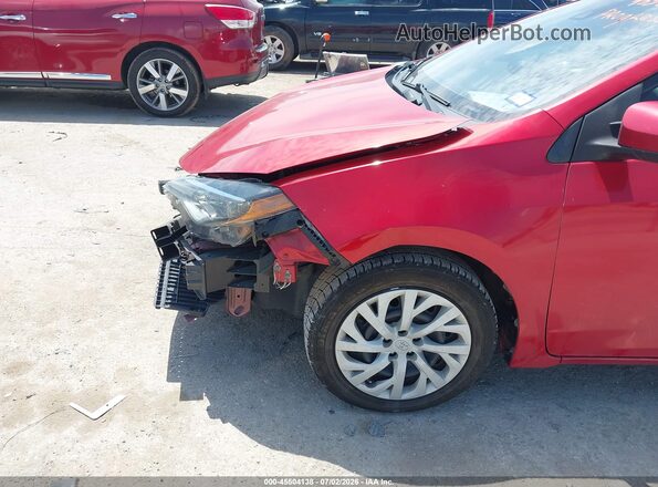 5YFBURHE4KP883983 2019 TOYOTA COROLLA Красный Вид спереди