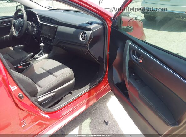 5YFBURHE4KP883983 2019 TOYOTA COROLLA Красный Вид салона спереди