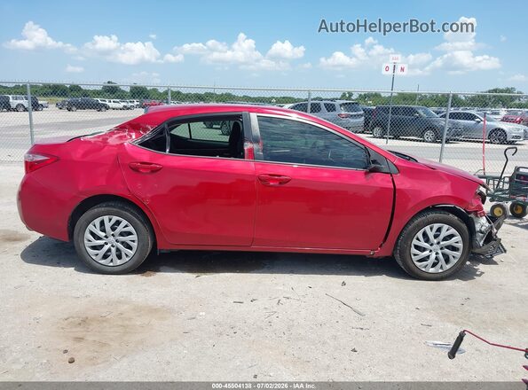 5YFBURHE4KP883983 2019 TOYOTA COROLLA Красный Вид задней части салона