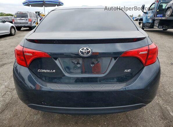 5YFBURHE4KP893140 2019 TOYOTA COROLLA Charcoal Հետևի տեսք