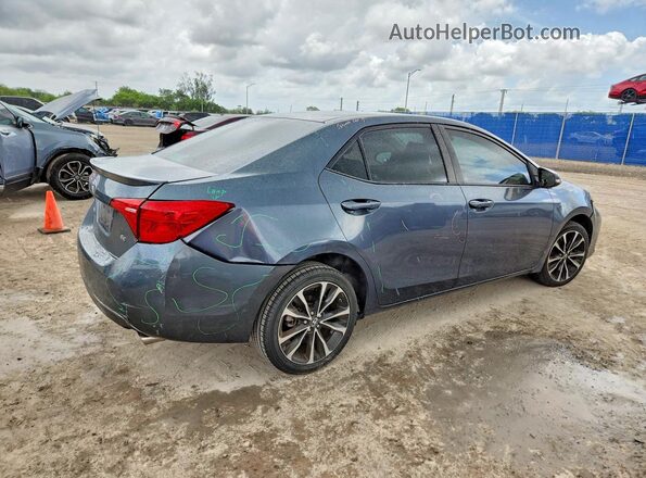 5YFBURHE5HP613007 2017 TOYOTA COROLLA Gray Trasero derecho