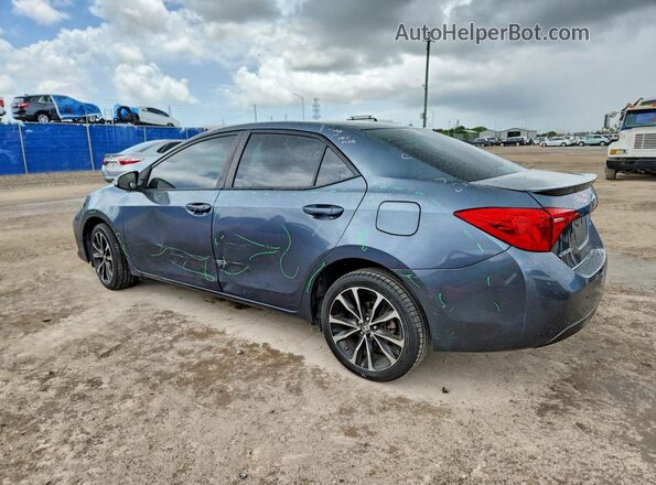5YFBURHE5HP613007 2017 TOYOTA COROLLA Gray Trasero izquierdo