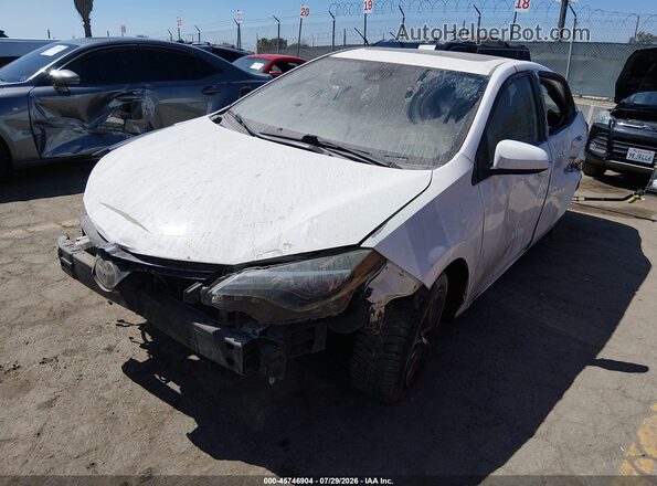 5YFBURHE5JP809986 2018 TOYOTA COROLLA White Front left