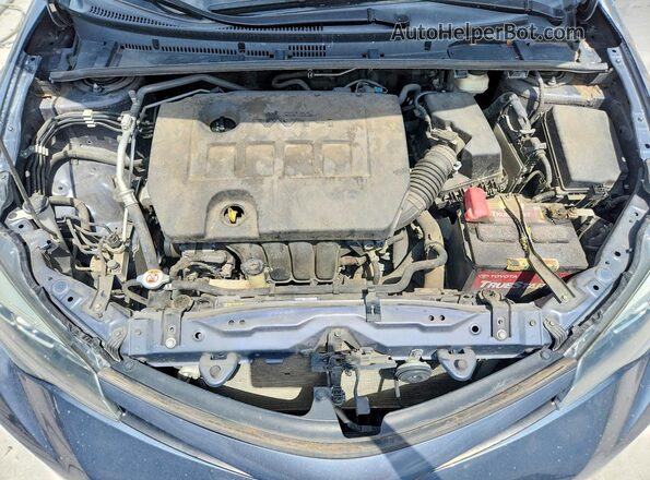 5YFBURHE5JP816565 2018 TOYOTA COROLLA Синий Вид задней части салона