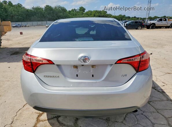 5YFBURHE5KP937825 2019 TOYOTA COROLLA Silver Rear view