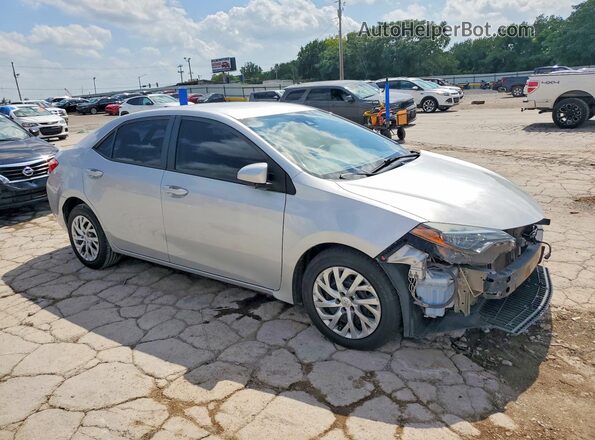 5YFBURHE5KP937825 2019 TOYOTA COROLLA Silver Front right