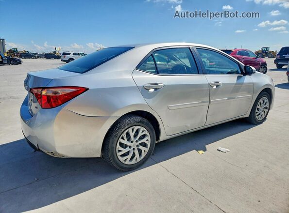 5YFBURHE6HP712306 2017 TOYOTA COROLLA Silver Trasero derecho