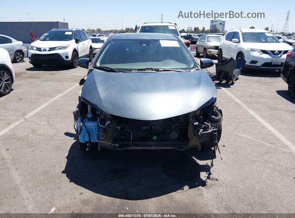 5YFBURHE6KP934903 2019 TOYOTA COROLLA Серый Вид задней части салона